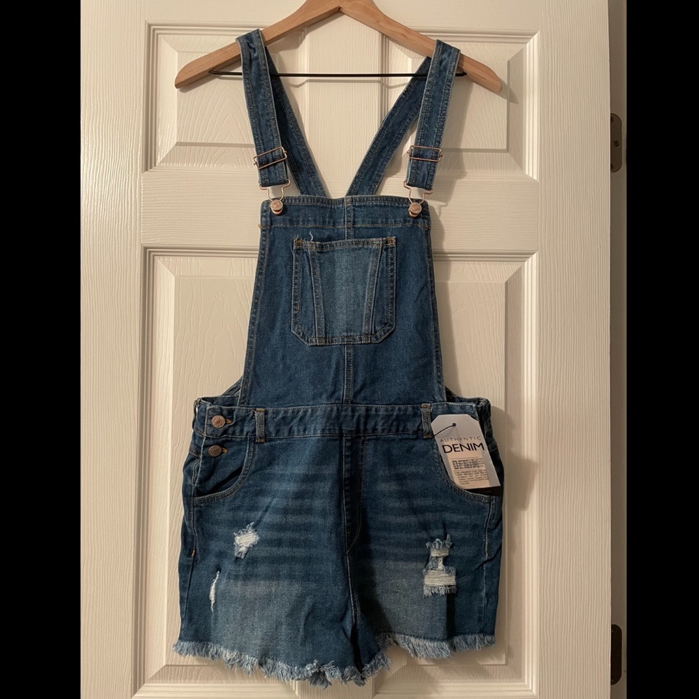 Pink Lily medium wash distressed denim overall shorts